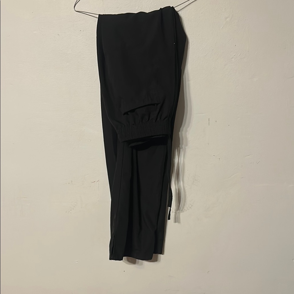 Wear for care LG scrub jacket with buttons 
and X-LG flare leg scrub pants